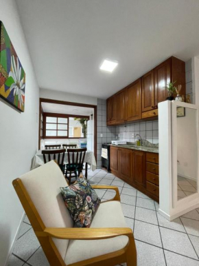 Apartamento aconchegante a 250 passos da praia de Jurerê